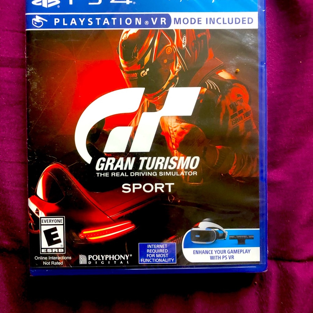 Gran Turismo game for PS 4. Never opened. Still in sealed case.